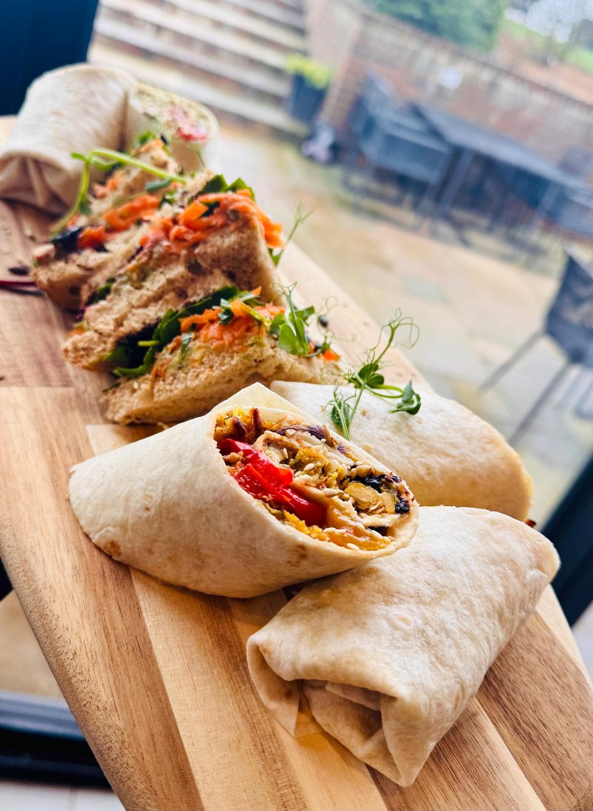 A Serving Platter of Wraps and Sanwiches