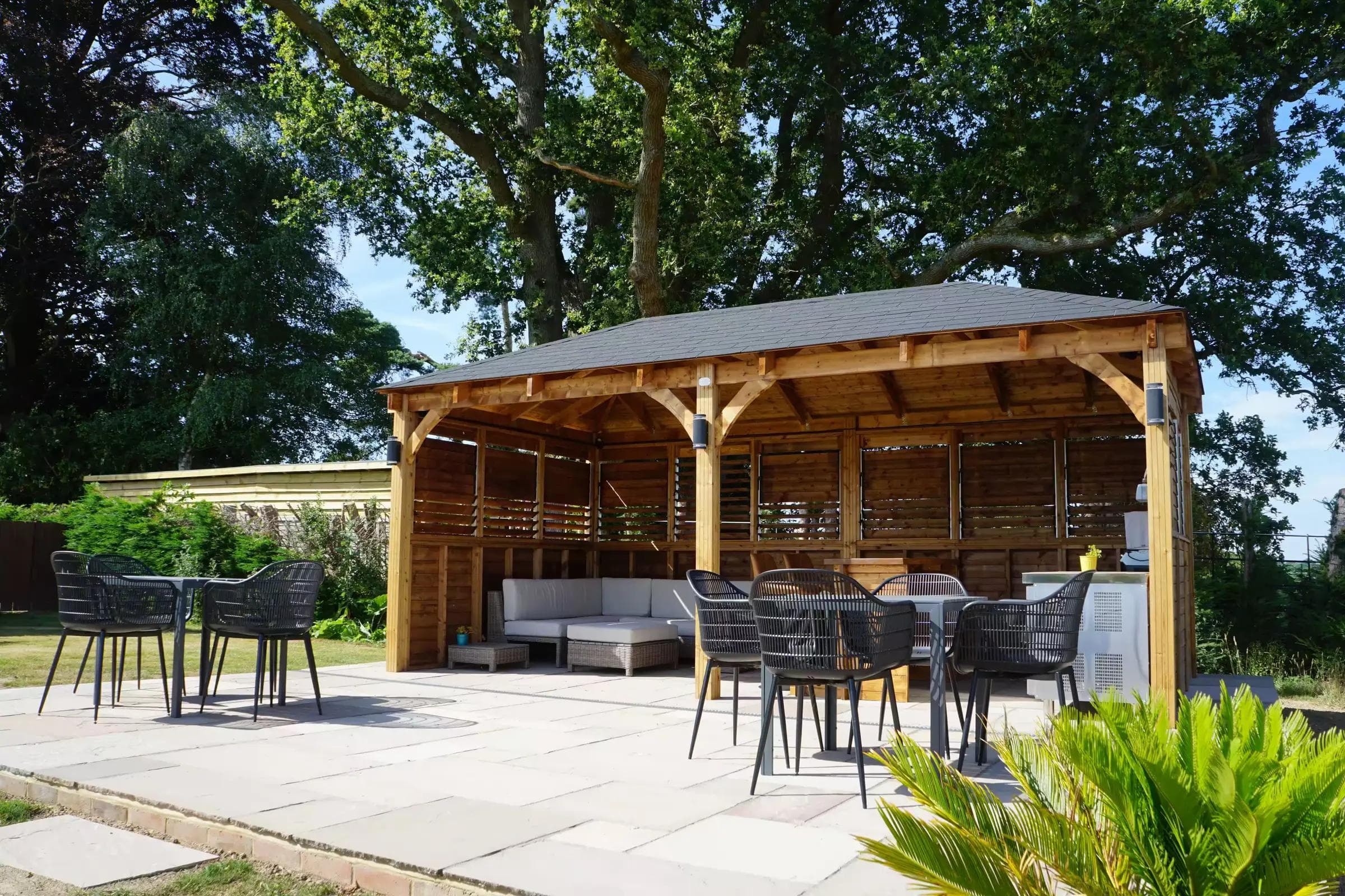 The Beech Bar, a covered outdoor bar and seating area at Knowle Grange